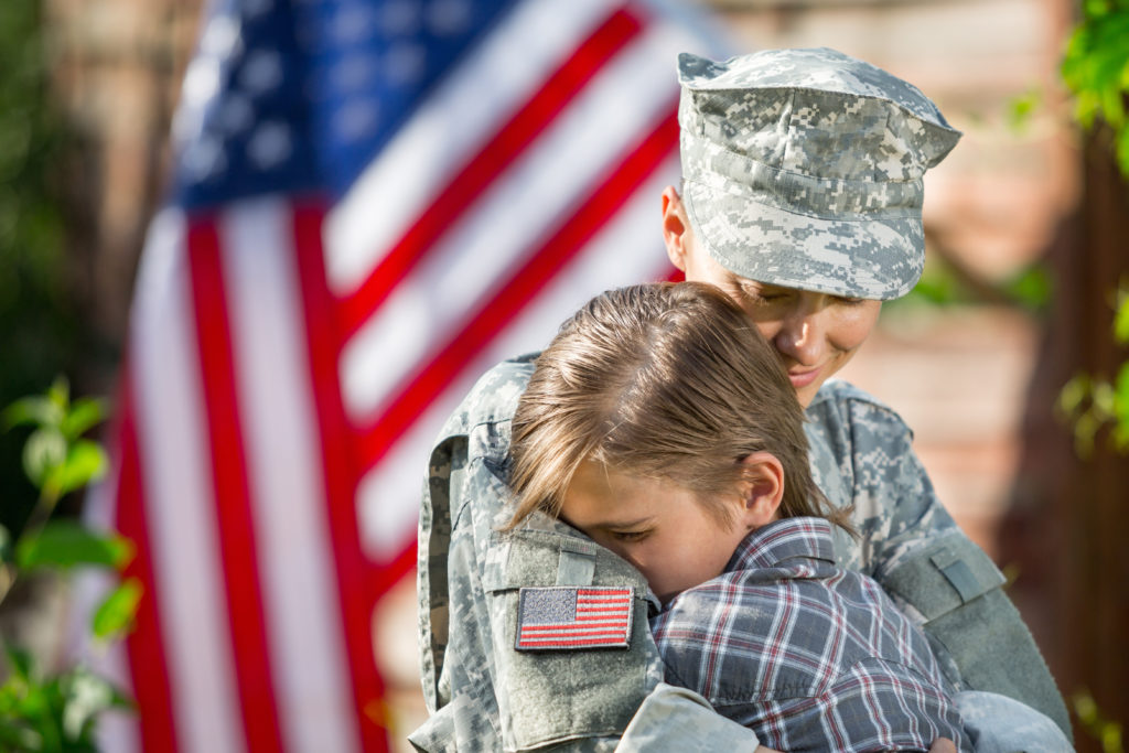 Female veteran and child